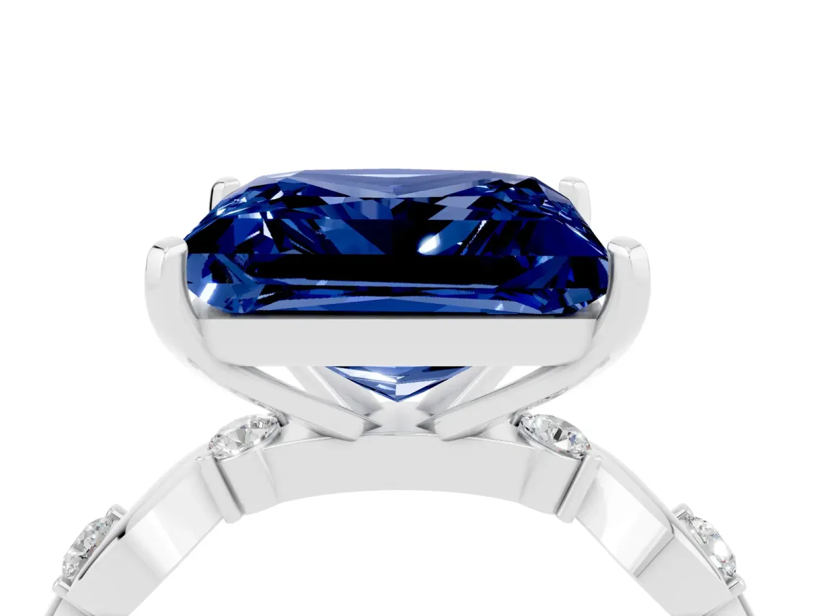Princess Cut Blue Sapphire Solitaire Twisted Band with Round Accents and Prong Setting White gold