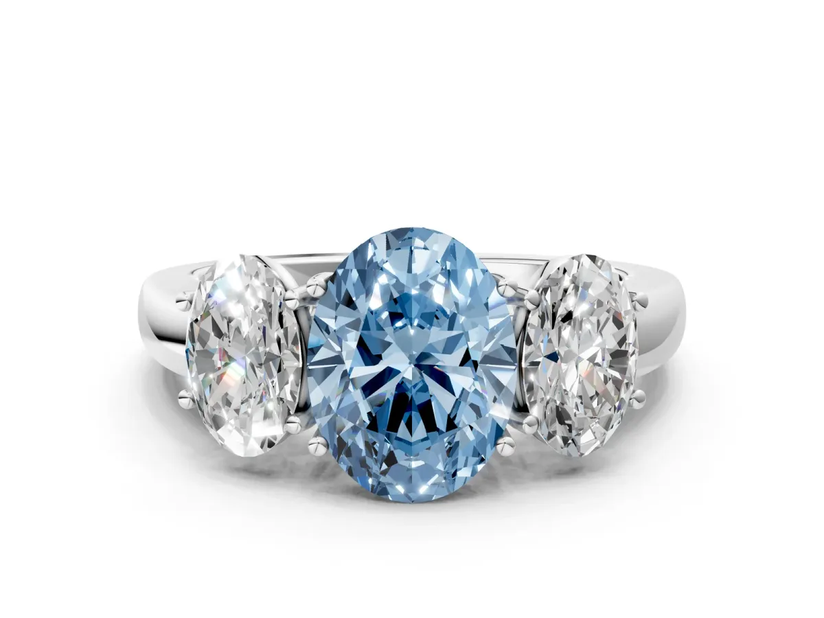 Fancy Blue Oval Cut Diamond Three-Stone Ring with Four-Prong Setting and Classic Band White gold