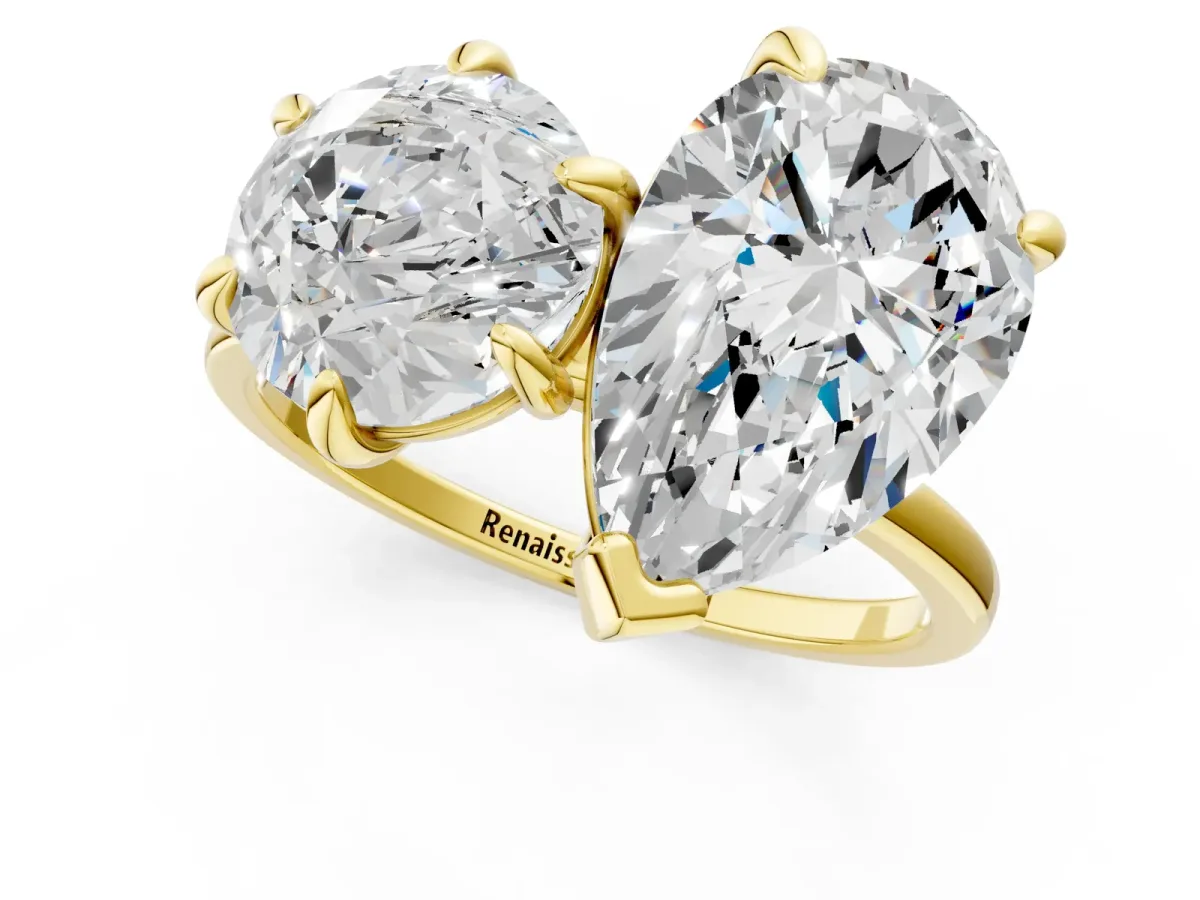 Round Cut and pear toi moi ring Yellow gold