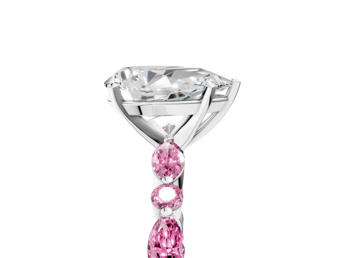 Pear Cut Diamond Ring with Marquise and Round Pink Sapphire Side Stones and Four-Prong Setting White gold