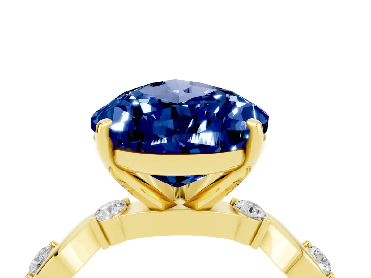 Pear Cut Blue Sapphire Solitaire Twisted Band with Round Accents and Prong Setting Yellow gold