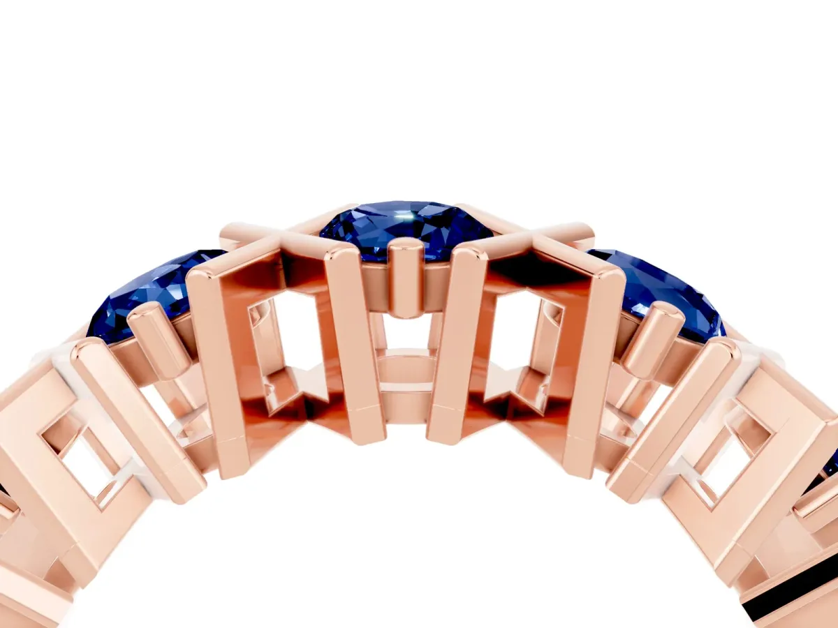 Round Blue Sapphire Channel Set Band with X-Prong Detail Rose gold