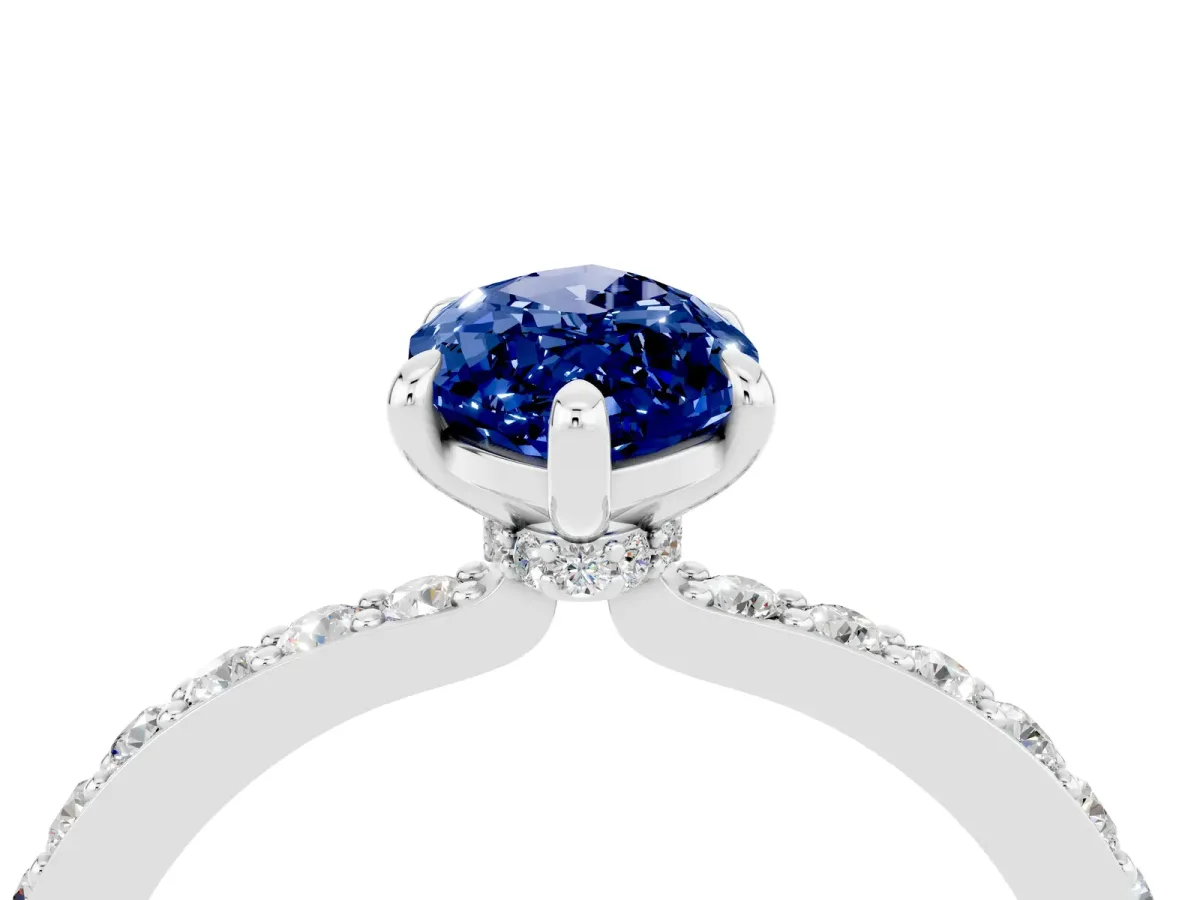 Marquise Cut Blue Sapphire Solitaire Engagement Ring with Pavé Band and Four-Prong Setting White gold
