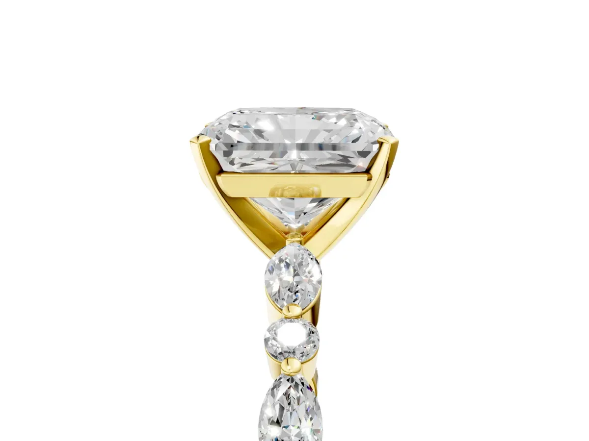 Radiant Cut Diamond Ring with Marquise and Round Side Stones and Four-Prong Setting Yellow gold