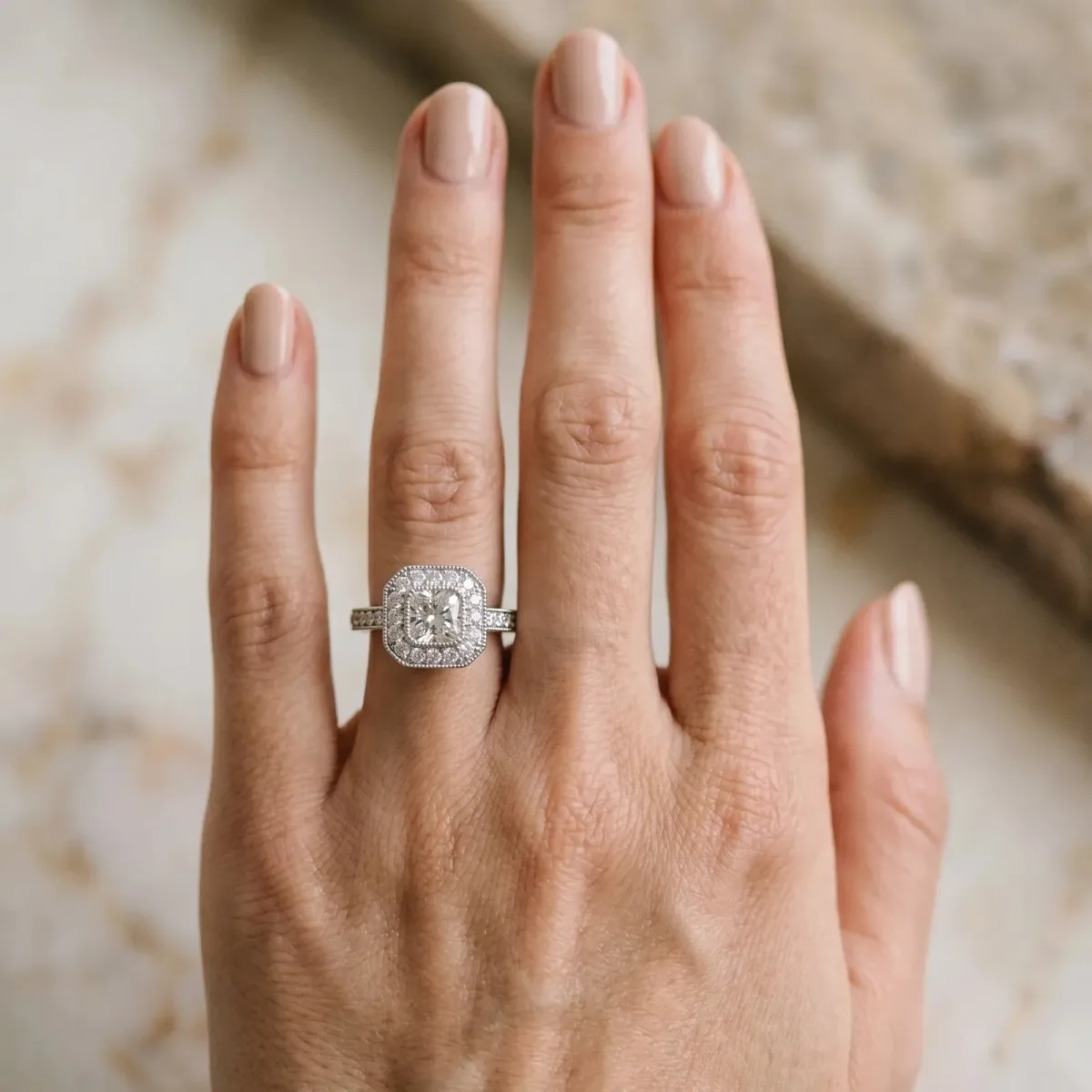 Cushion Cut-Cut Diamond Halo Engagement Ring with Pave Band and Prong Setting White gold