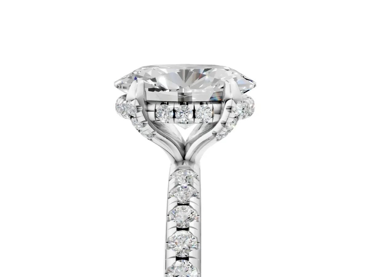 Oval Cut Diamond Hidden Halo Engagement Ring with Round Pavé Band and Prong Setting White gold