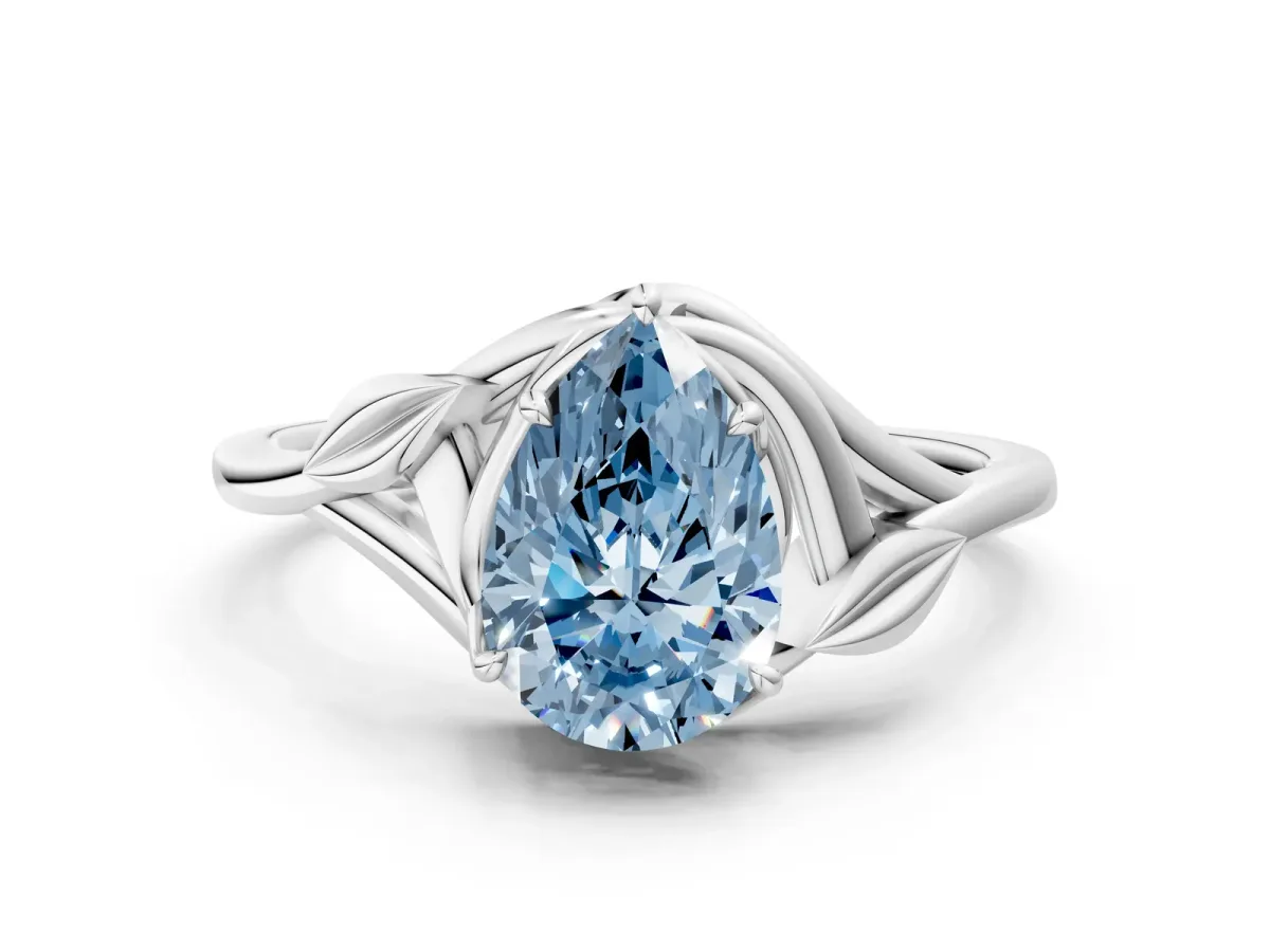 Fancy Blue Pear Cut Diamond Solitaire Ring with Twist Band and Four-Prong Setting Platinum