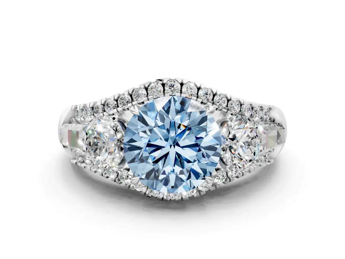 Fancy Blue Three-Stone Round Cut Diamond Engagement Ring with Pave Band and Prong Setting Platinum