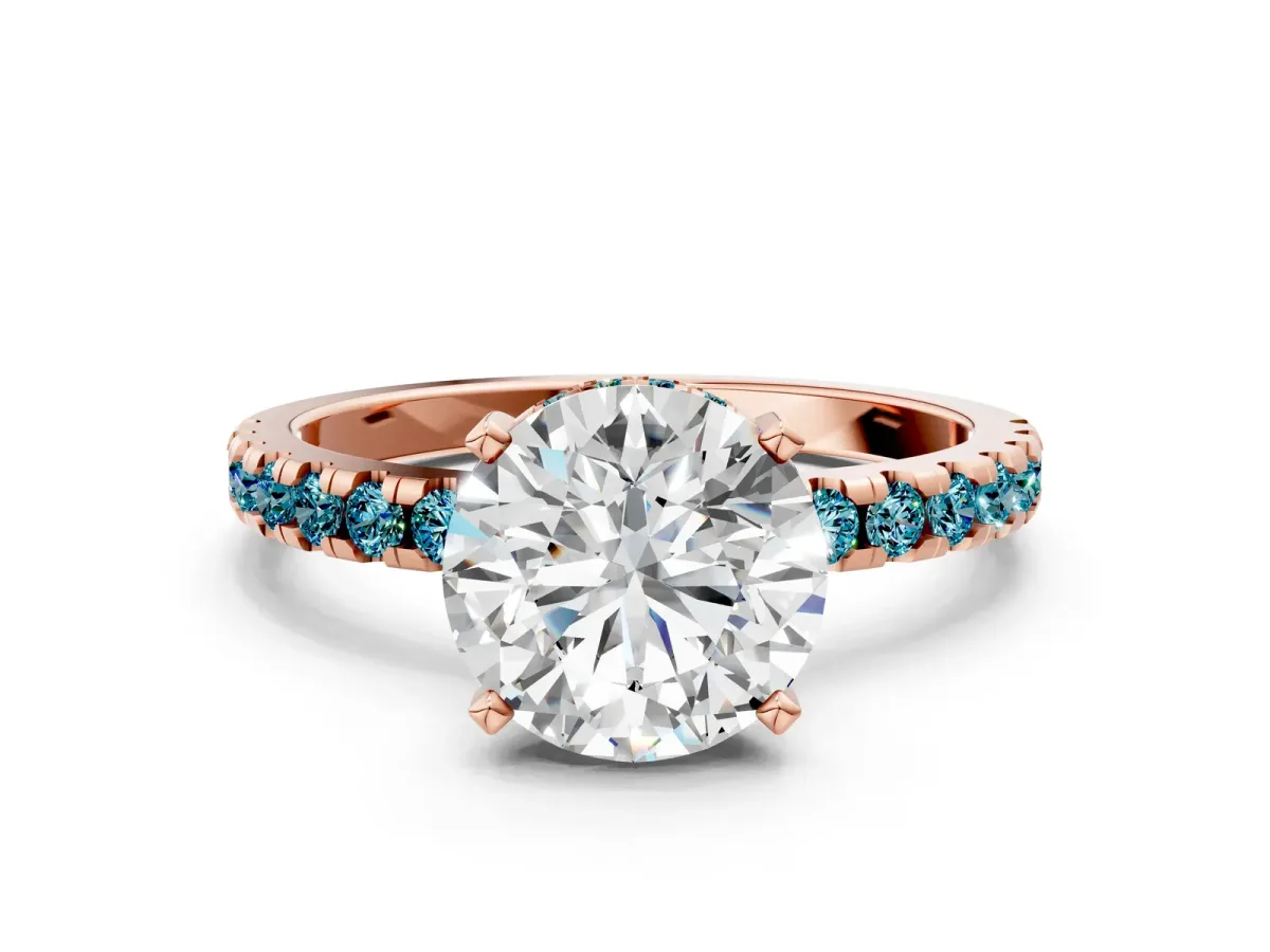 Round Cut Diamond Solitaire Ring with Round Blue Topaz Pavé Band and Four-Prong Setting Rose gold