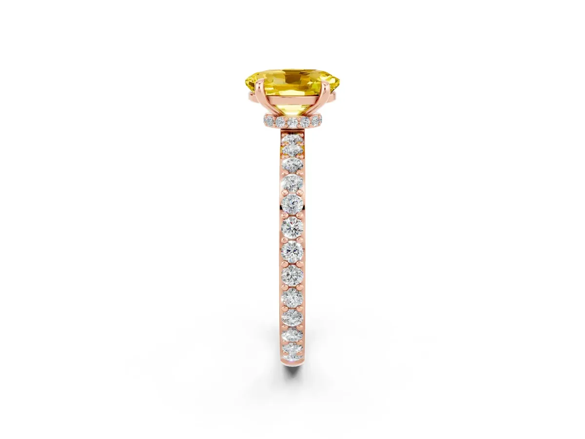 Oval Cut Yellow Sapphire Solitaire Engagement Ring with Pavé Band and Four-Prong Setting Rose gold