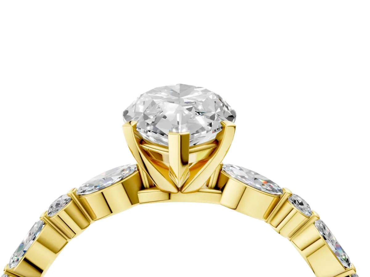 Marquise Cut Diamond Ring with Marquise and Round Side Stones and Four-Prong Setting Yellow gold
