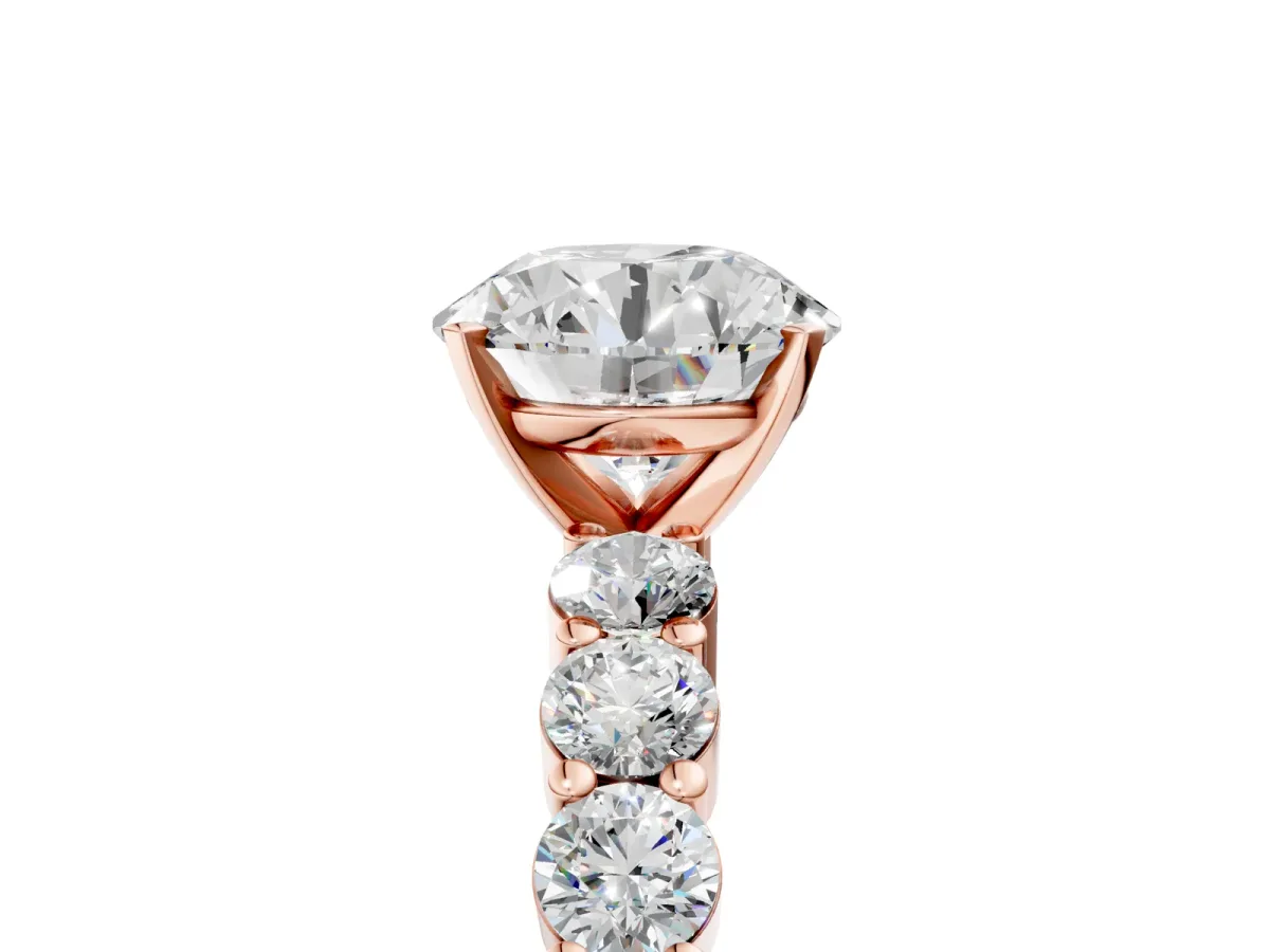 Round Cut Diamond Solitaire Ring with Shared Prong Round Side Stones Rose gold