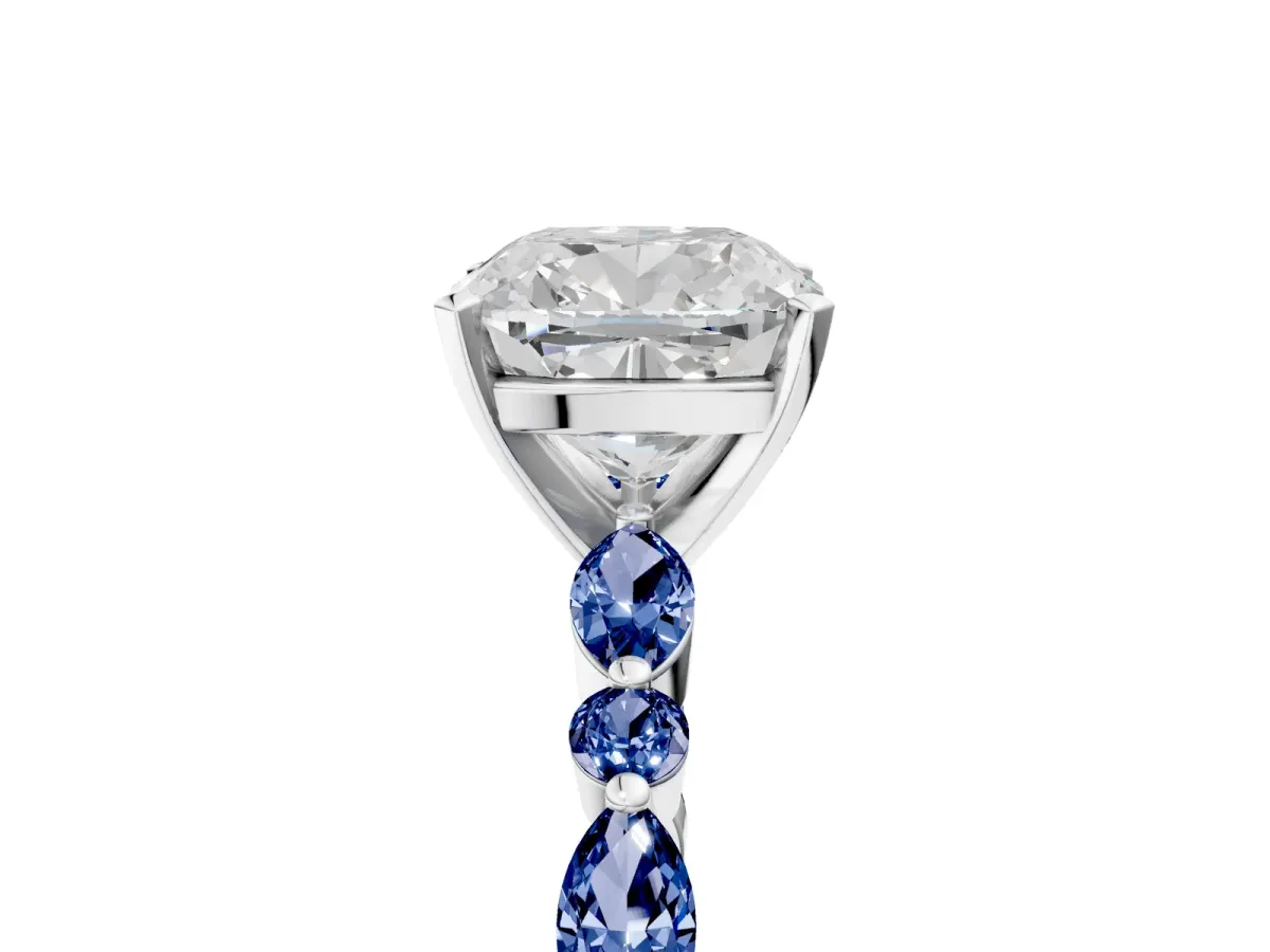 Cushion Cut Diamond Ring with Marquise and Round Blue Sapphire Side Stones and Four-Prong Setting White gold