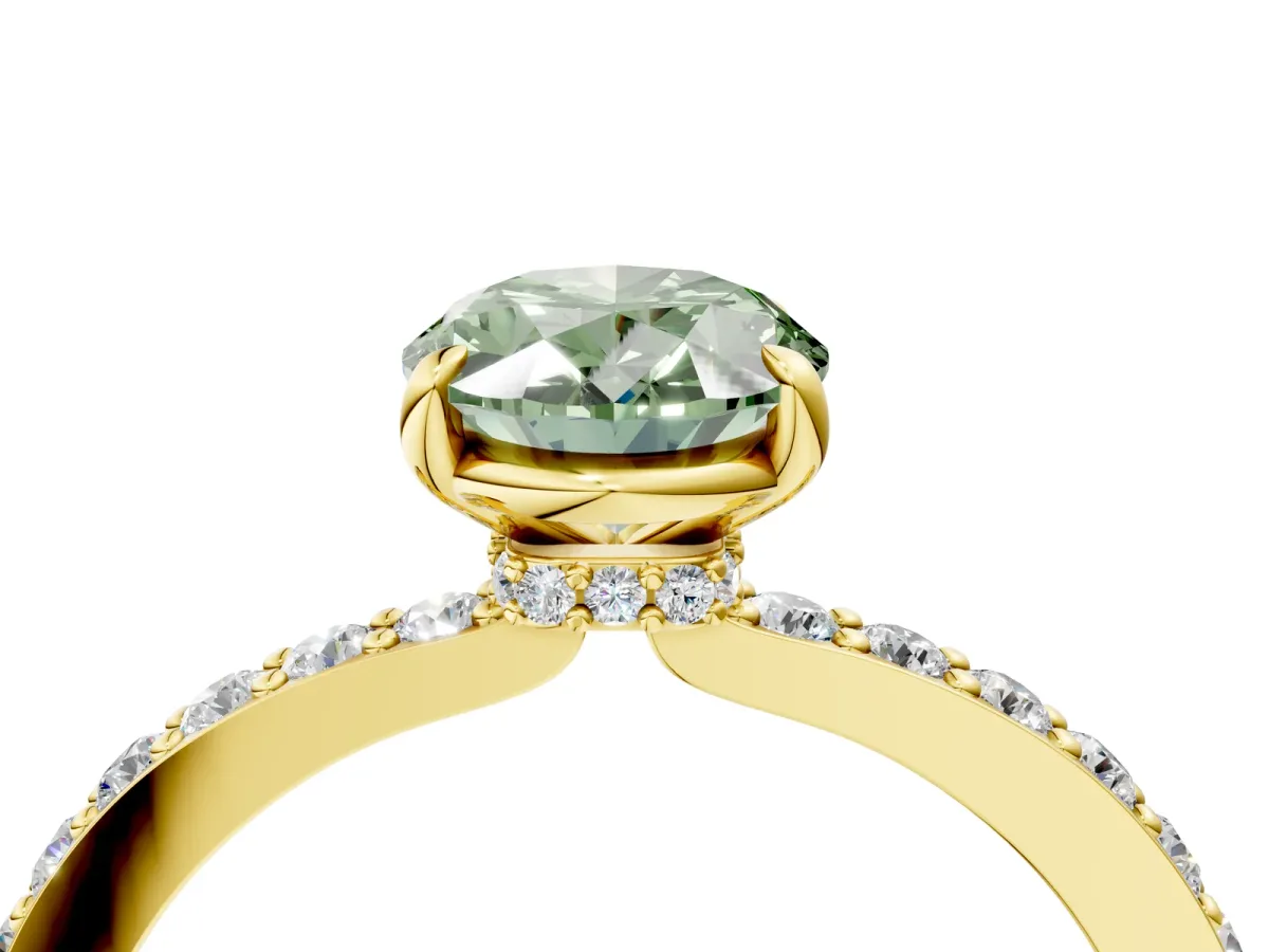 Fancy Green Oval Cut Diamond Solitaire Engagement Ring with Pavé Band and Four-Prong Setting Yellow gold
