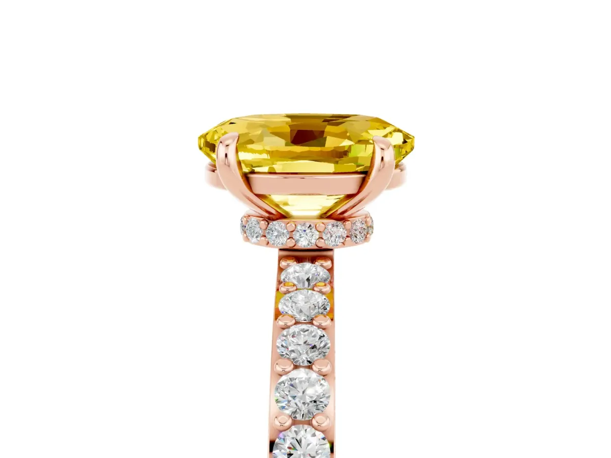 Oval Cut Yellow Sapphire Solitaire Engagement Ring with Pavé Band and Four-Prong Setting Rose gold