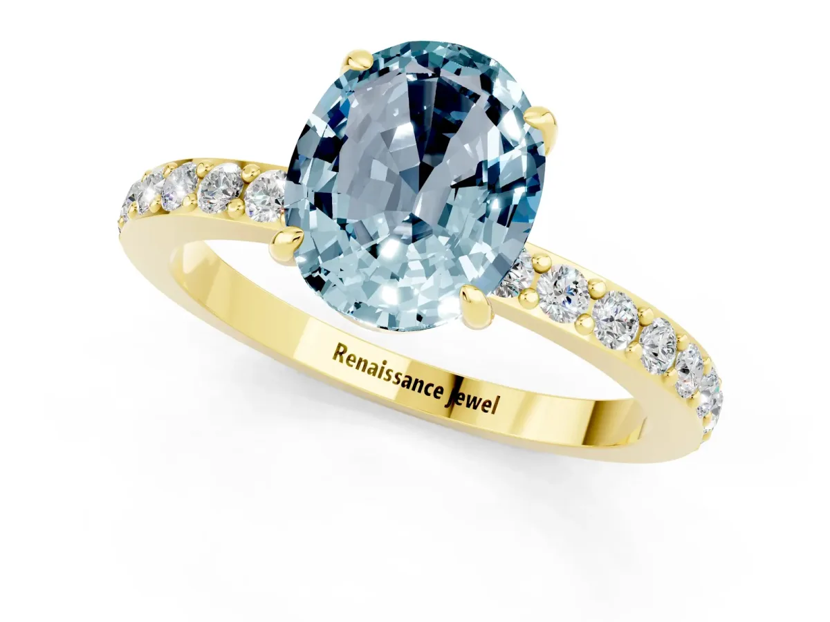Oval Cut Aquamarine Solitaire Engagement Ring with Pavé Band and Four-Prong Setting Yellow gold