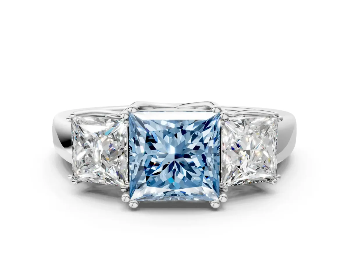 Fancy Blue Three-Stone Princess Cut Cut Diamond Ring with Channel Set Band and Four-Prong Setting Silver