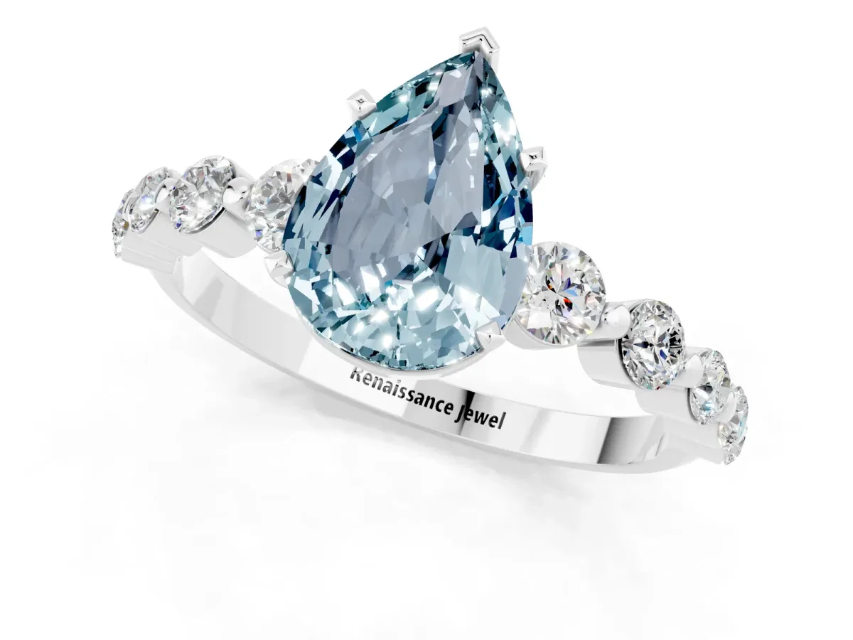 Pear Cut Solitaire Aquamarine Ring with Pave Band and Four-Prong Setting Silver