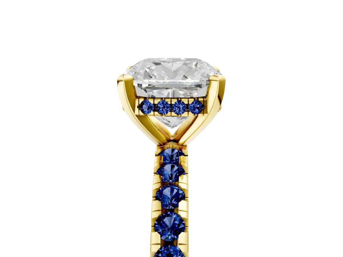 Cushion Cut Diamond Solitaire Ring with Round Blue Sapphire Pavé Band and Four-Prong Setting Yellow gold