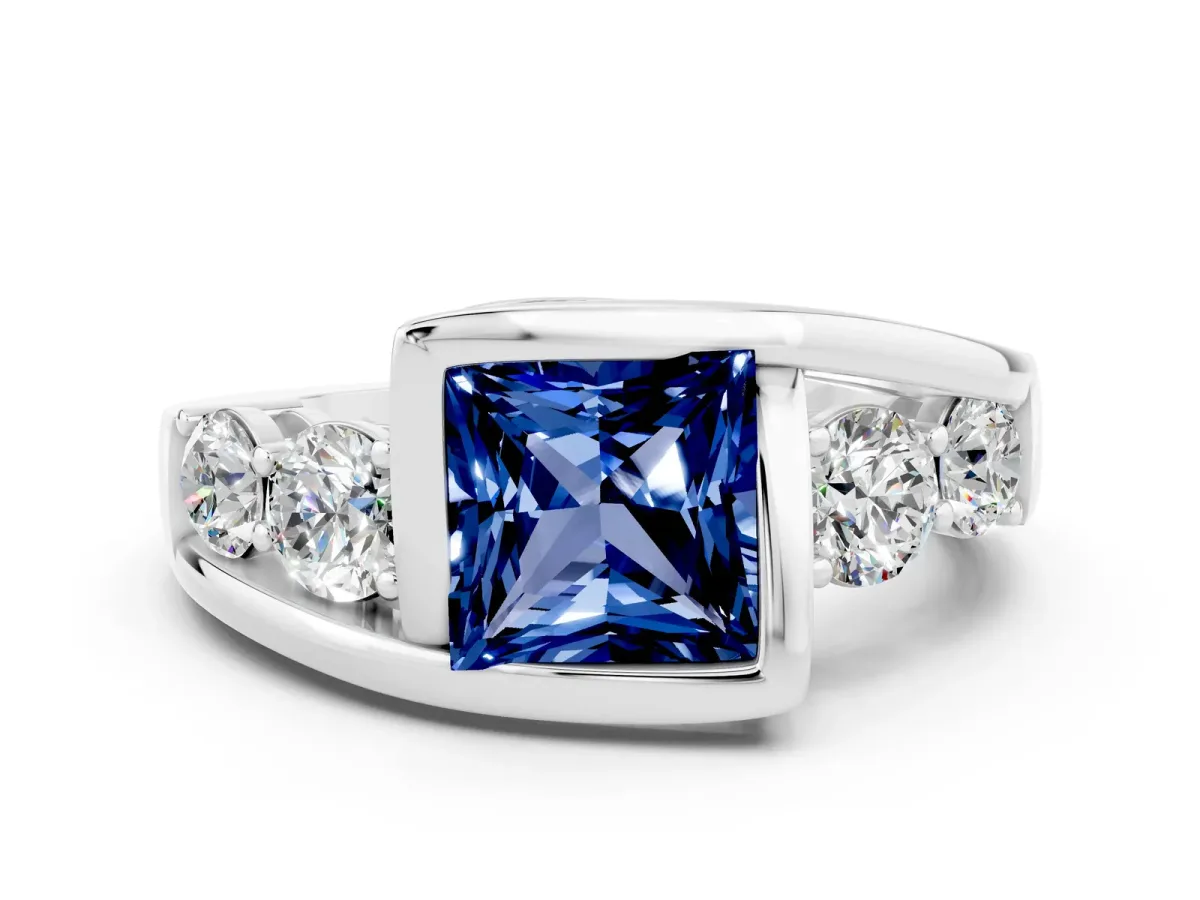 Bezel Set Princess Cut Blue Sapphire Bypass Ring with Round Accents Silver