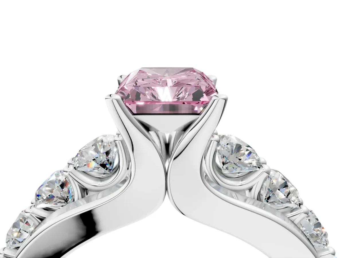 Fancy Pink Radiant Cut Brilliant Solitaire with Side Stones on a Pave Band and Four-Prong Setting Platinum