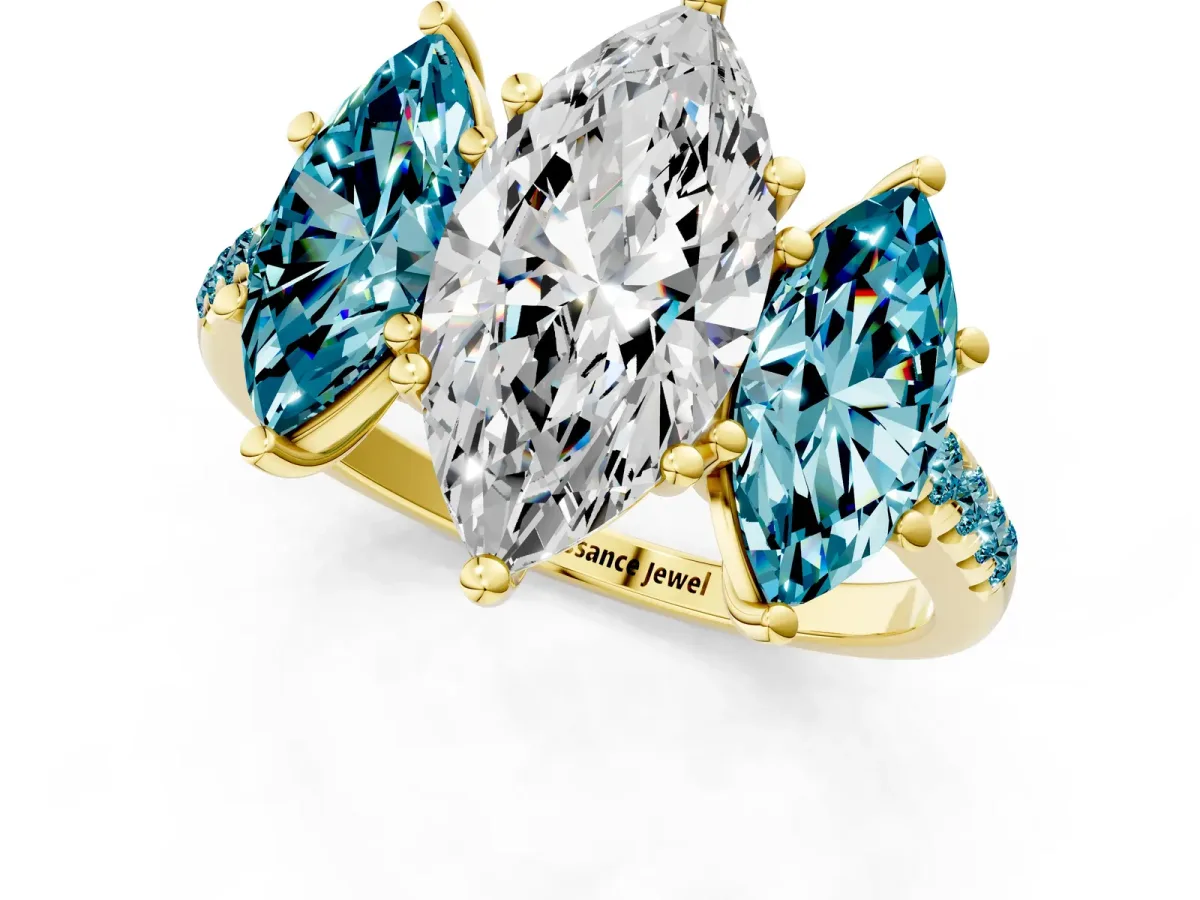 Three-Stone Marquise Cut Diamond Ring with Round Blue Topaz Pavé Band and Prong Setting Yellow gold