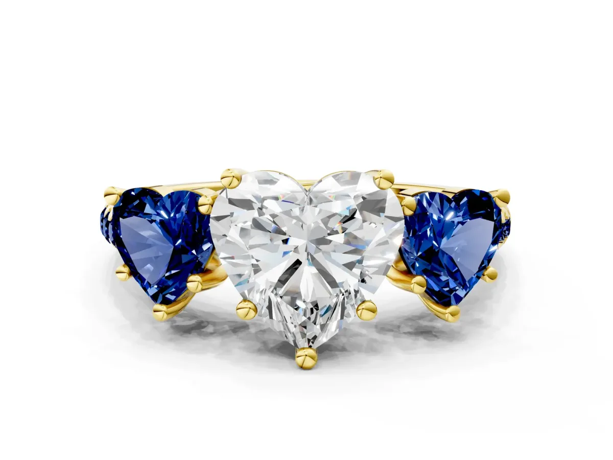 Three-Stone Heart Cut Diamond Ring with Round Blue Sapphire Pavé Band and Prong Setting Yellow gold