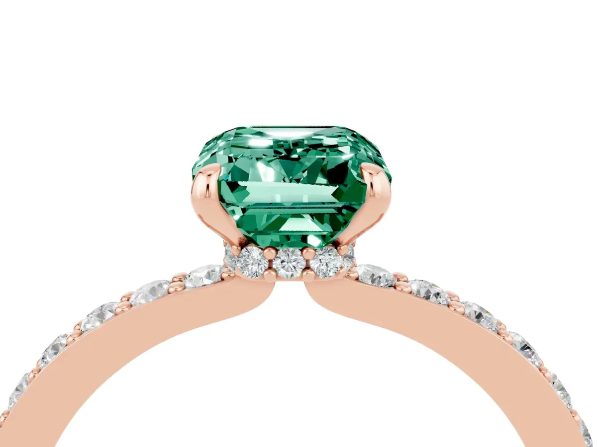 Emerald Cut Green Sapphire Solitaire Engagement Ring with Pavé Band and Four-Prong Setting Rose gold
