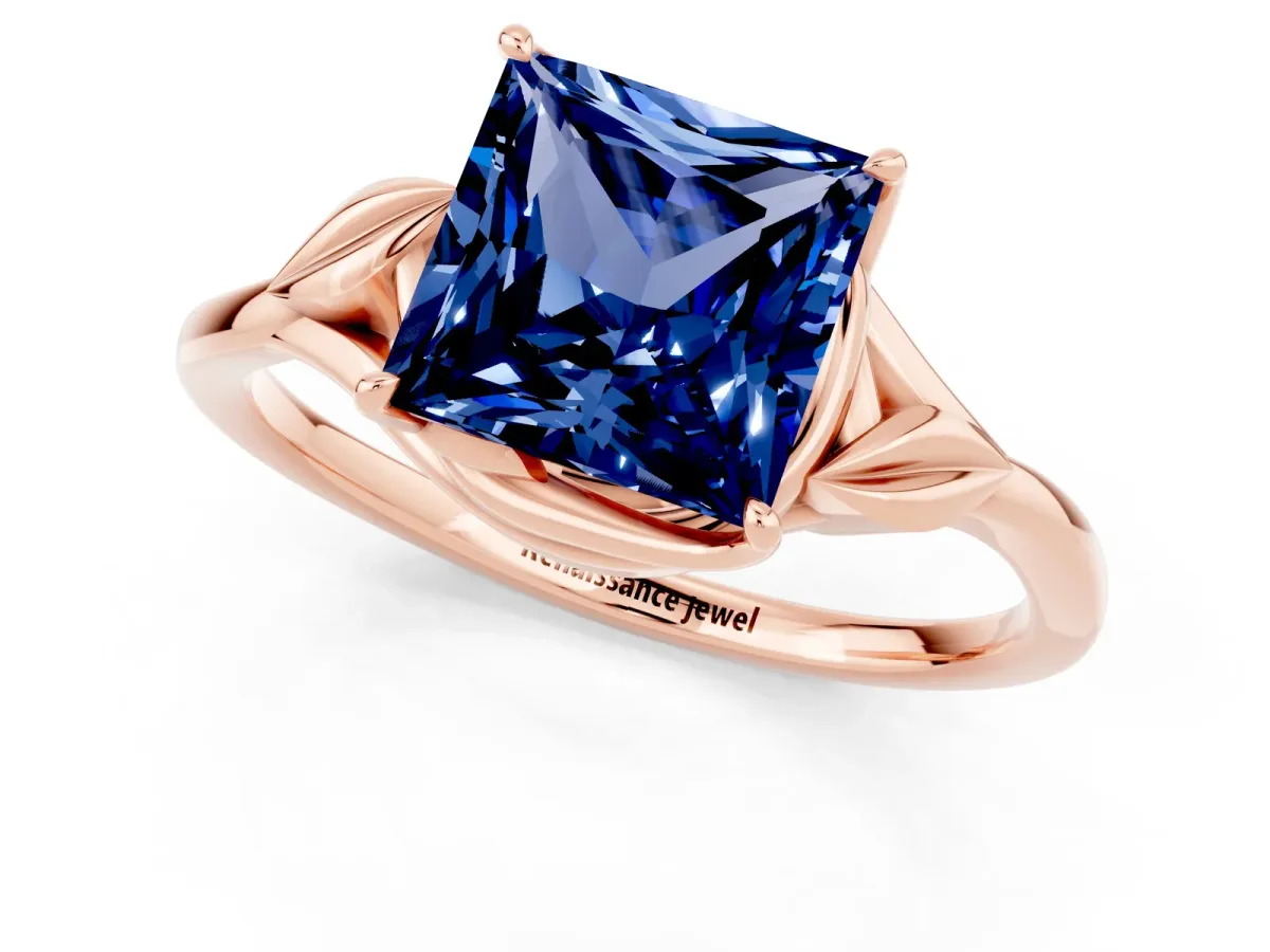 Princess Cut Blue Sapphire Solitaire Ring with Twist Band and Four-Prong Setting Rose gold