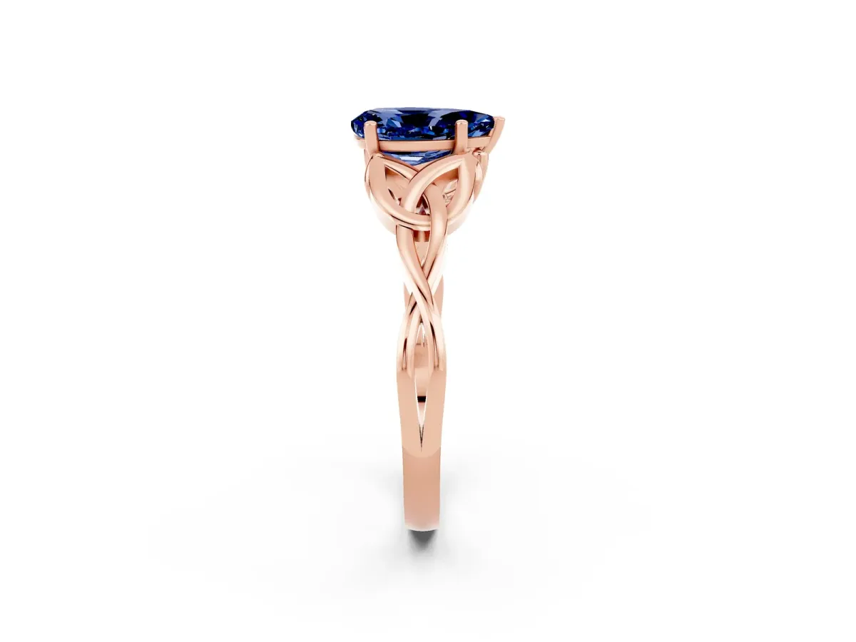 Pear Cut Blue Sapphire Solitaire Celtic Knot Ring with Four-Prong Setting Rose gold