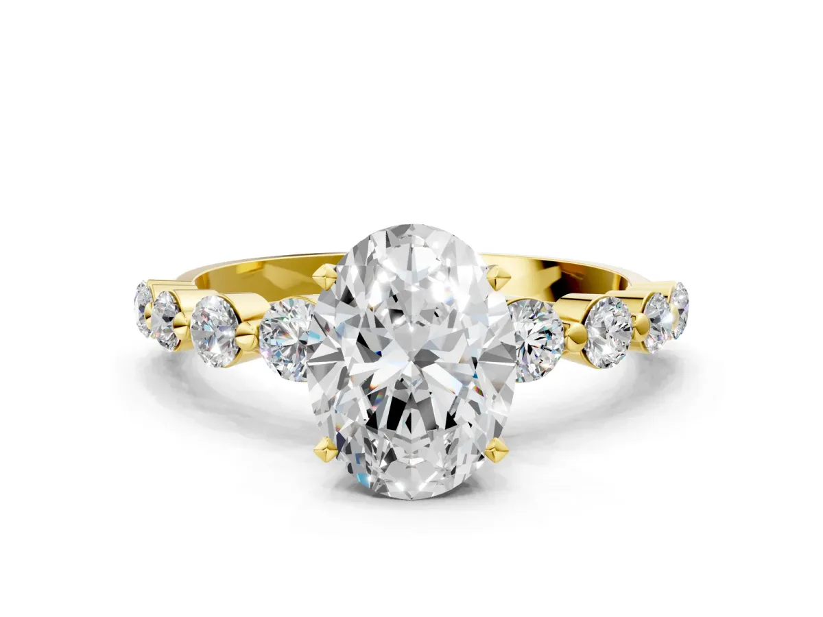 Oval Cut Solitaire Diamond Ring with Pave Band and Four-Prong Setting Yellow gold