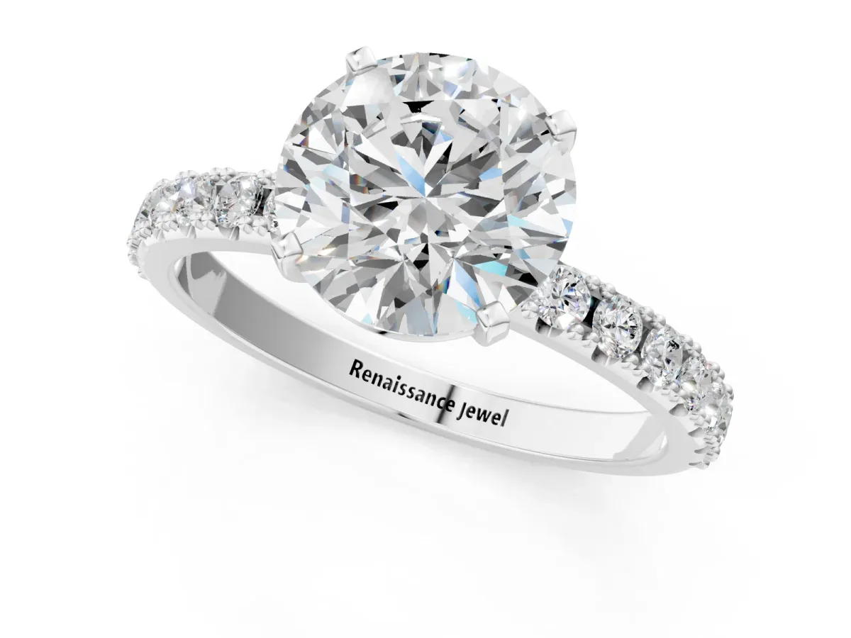 Round Cut Diamond Solitaire Pavé Band with Four-Prong Setting Silver