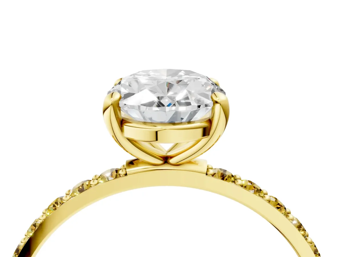 Oval Cut Diamond Solitaire Ring with Round Yellow Sapphire Pavé Band and Prong Setting Yellow gold