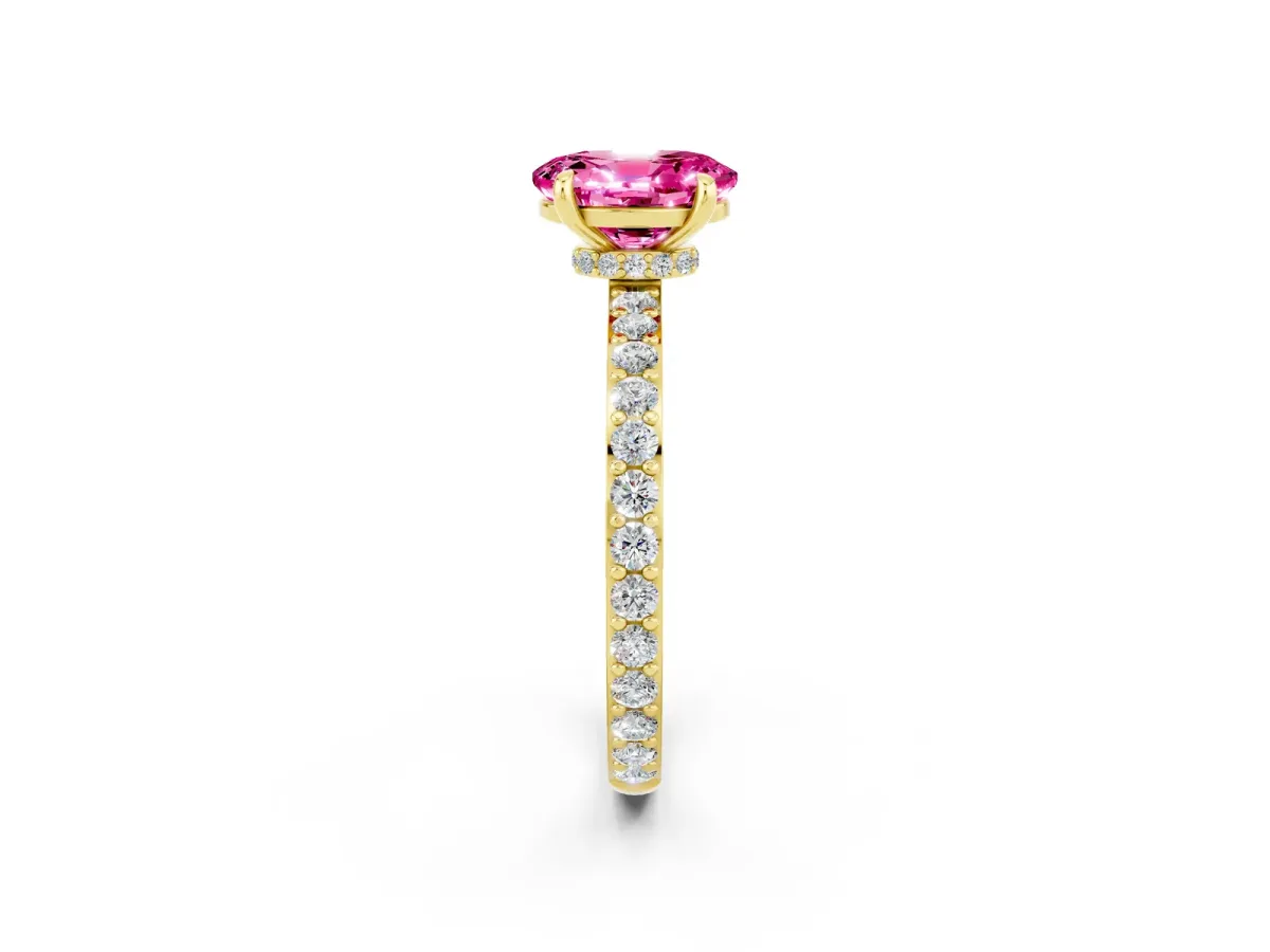 Oval Cut Pink Sapphire Solitaire Engagement Ring with Pavé Band and Four-Prong Setting Yellow gold