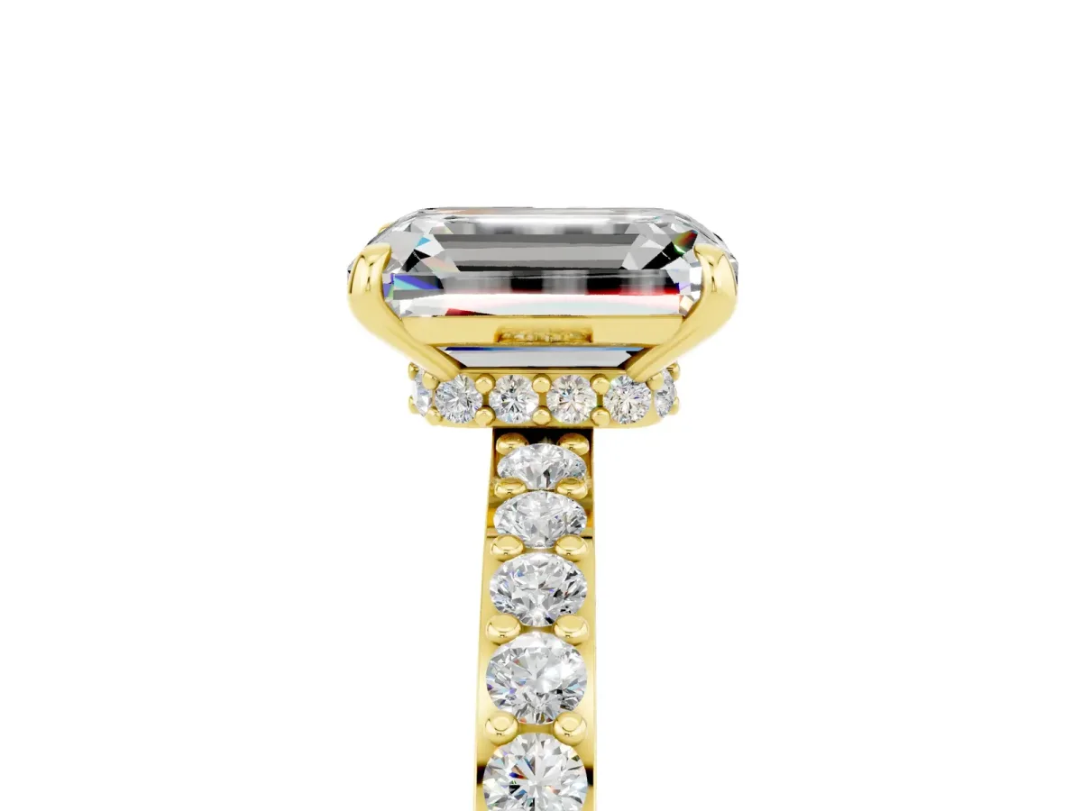 Emerald Cut Moissanite Solitaire Engagement Ring with Pavé Band and Four-Prong Setting Yellow gold