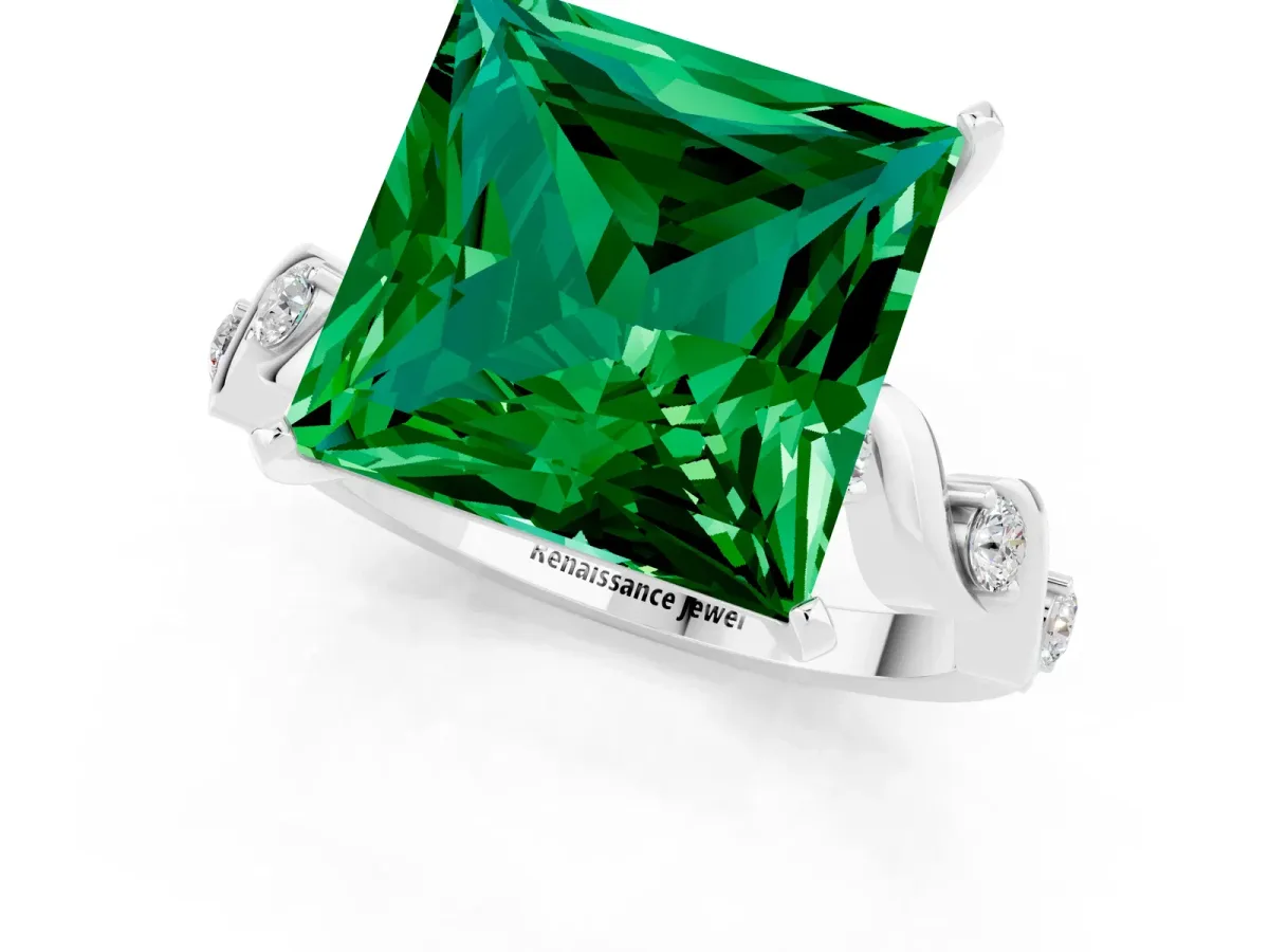 Princess Cut Emerald Solitaire Twisted Band with Round Accents and Prong Setting Silver