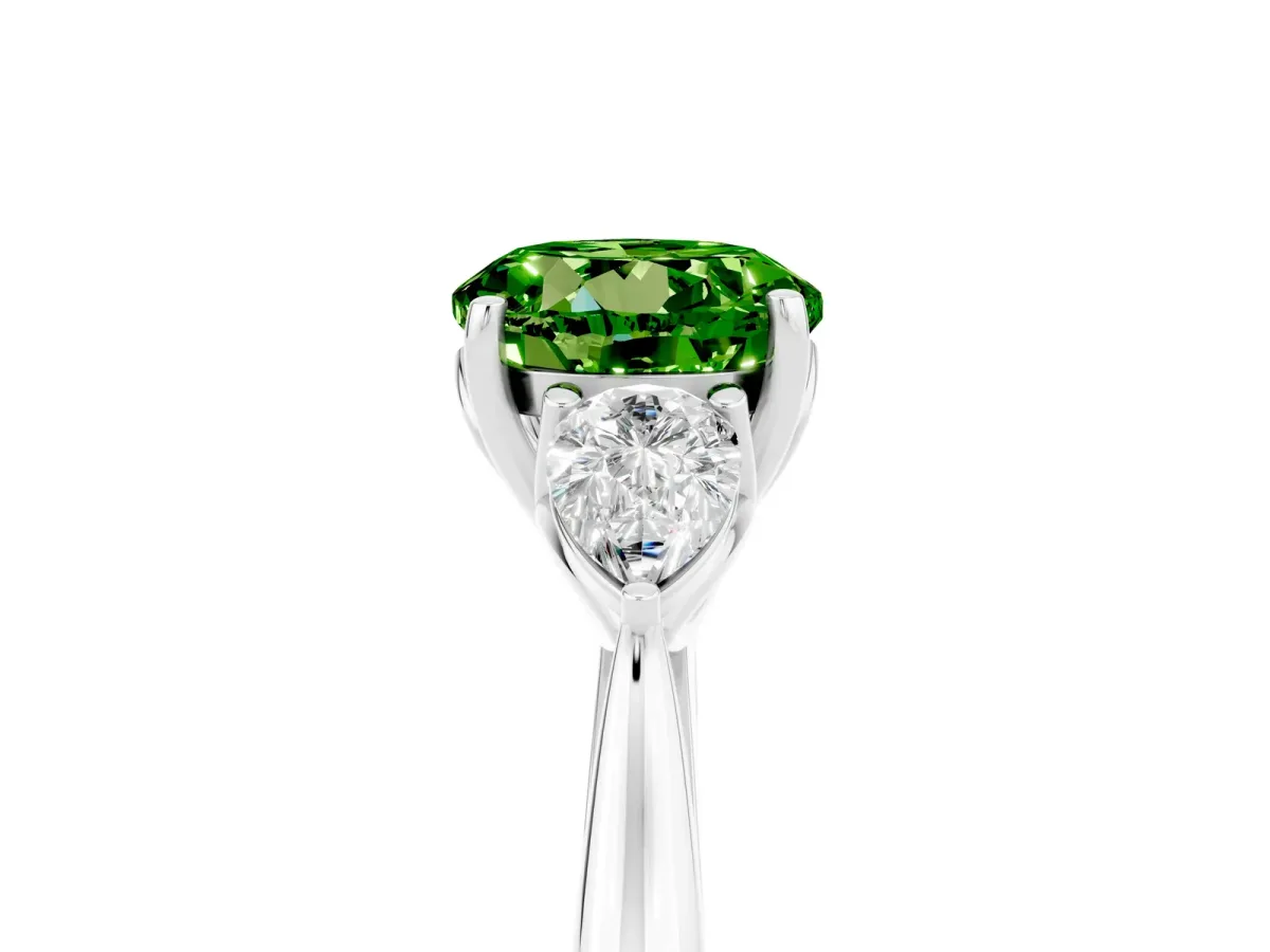 Three-Stone Round Cut Peridot Ring with Pear Side Stones in Four-Prong Setting Platinum
