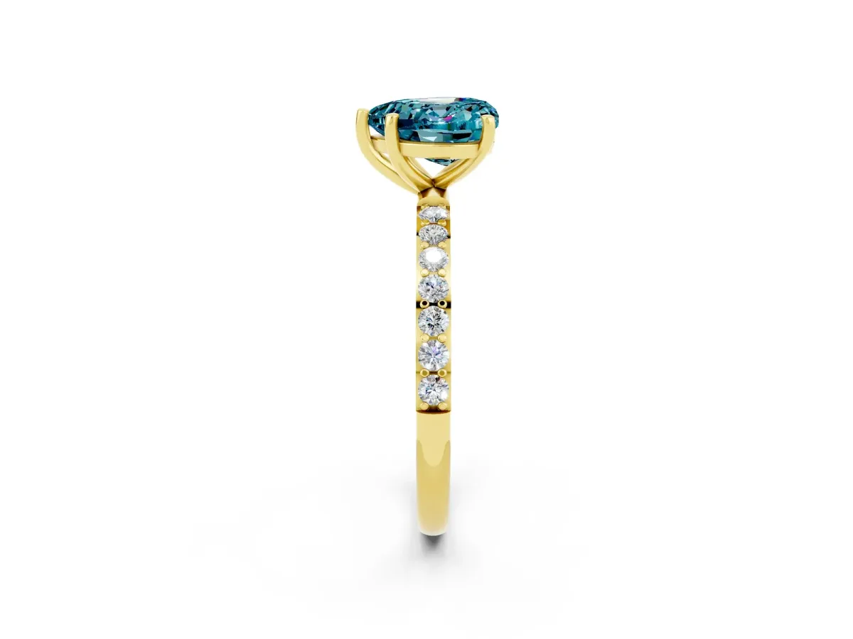 Heart Cut Blue Topaz Solitaire Ring with Round Pavé Band and Prong Setting Yellow gold