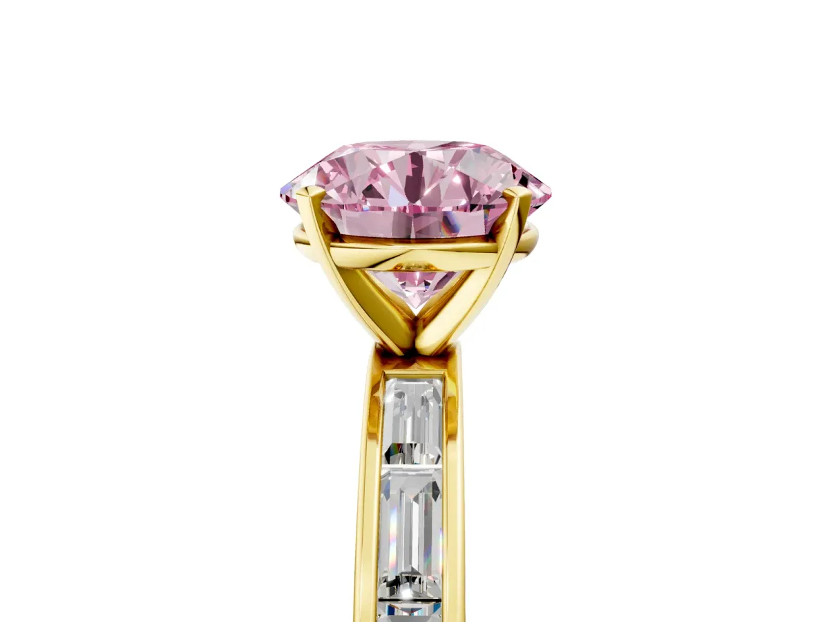 Fancy Pink Round Cut Solitaire Diamond Ring with Channel-Set Baguette Band and Four-Prong Setting Yellow gold