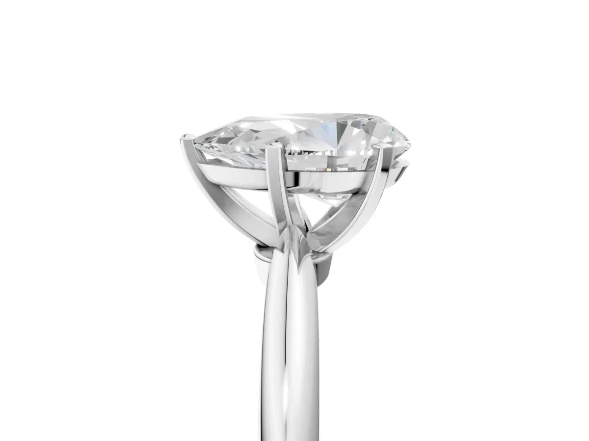 Pear Cut Diamond Solitaire Ring with Six-Prong Setting and Classic Band Platinum