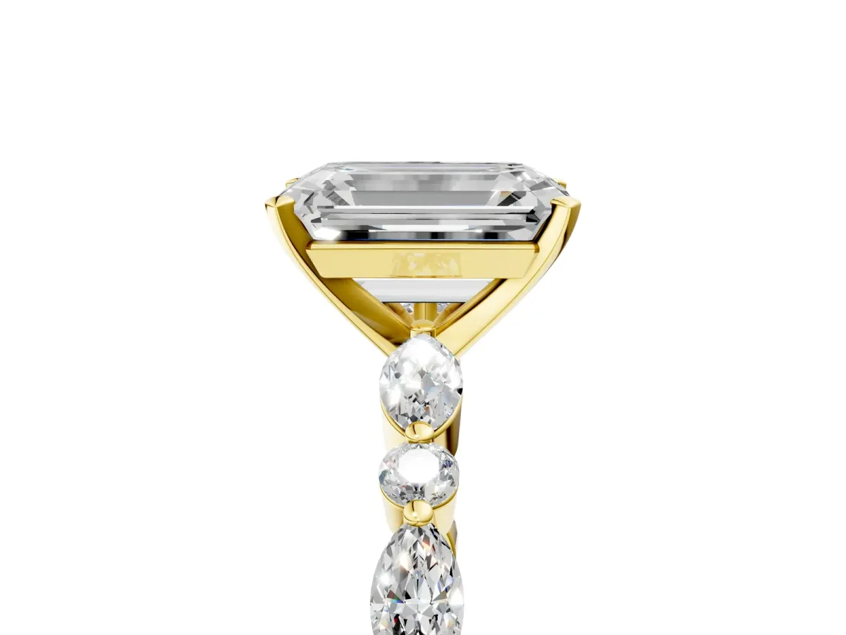 Emerald Cut Diamond Ring with Marquise and Round Moissanite Side Stones and Four-Prong Setting Yellow gold