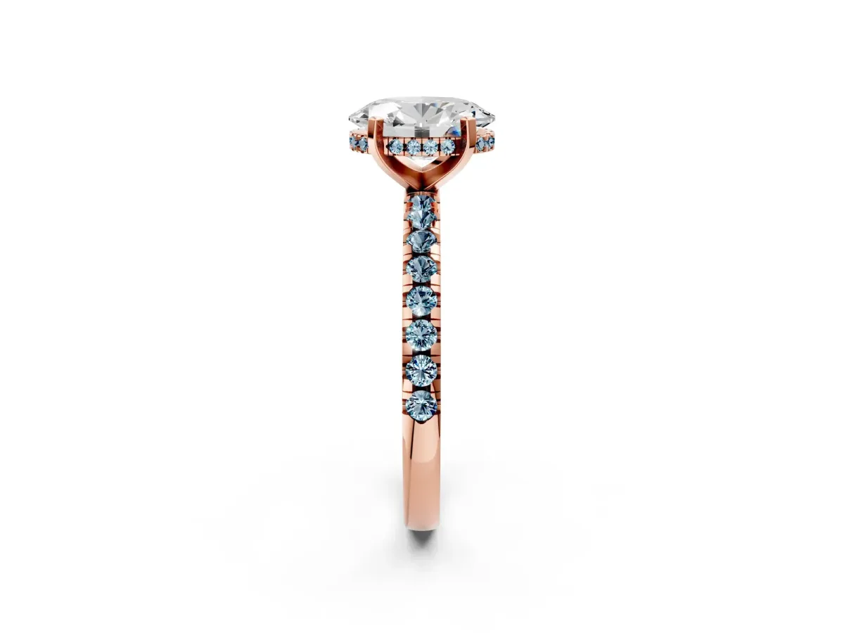 Oval Cut Diamond Solitaire Ring with Round Aquamarine Pavé Band and Four-Prong Setting Rose gold