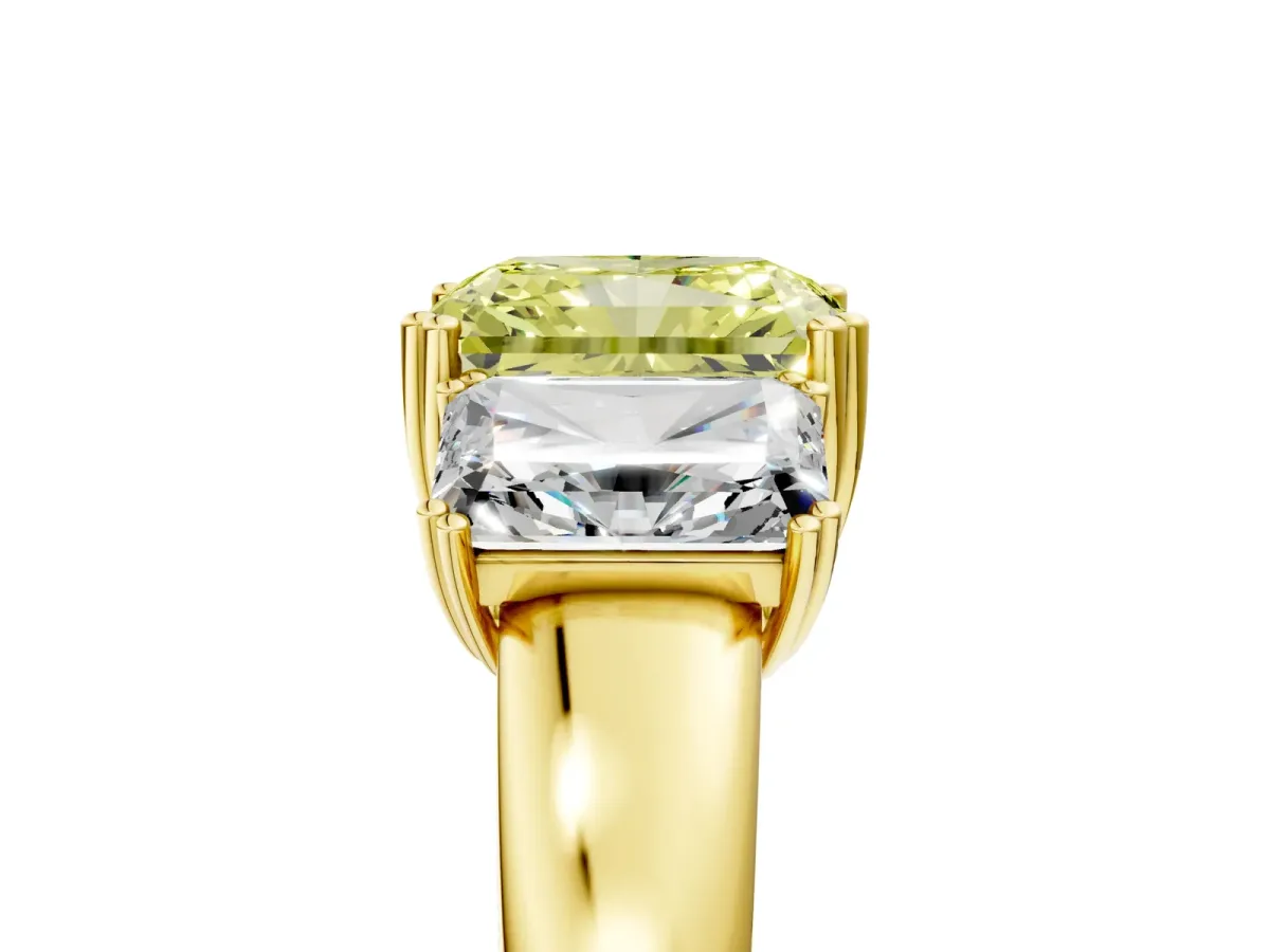 Fancy Yellow Three-Stone Radiant Cut Cut Diamond Ring with Channel Set Band and Four-Prong Setting Yellow gold