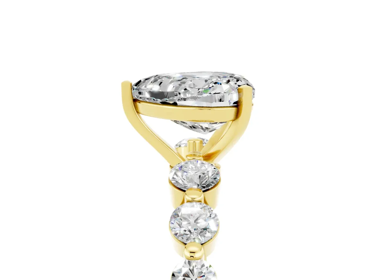 Heart Cut Solitaire Moissanite Ring with Pave Band and Four-Prong Setting Yellow gold