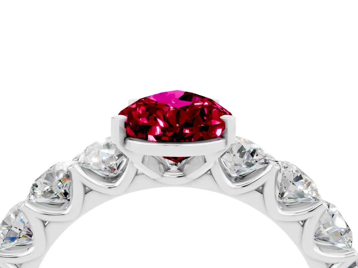 Pear Cut Garnet Prong Setting with Side Stones on a Pave Band Silver