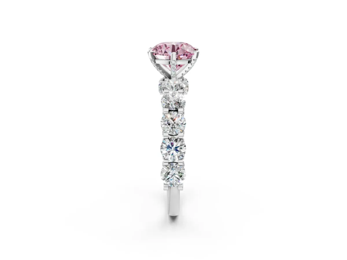 Fancy Pink Round Cut Diamond Side Stone Engagement Ring with Four-Prong Setting Silver