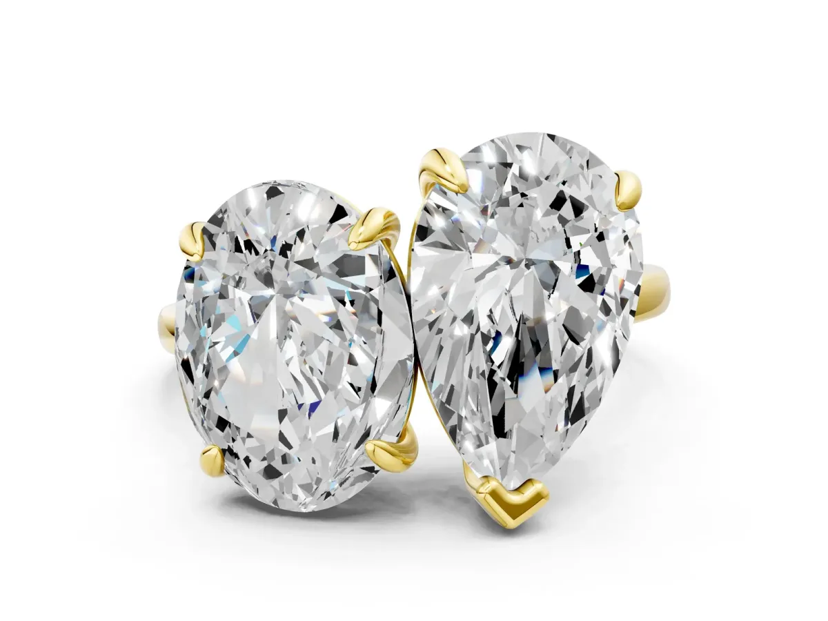 Oval and Pear Toi Moi Ring with Prong Setting and Plain Band Yellow gold
