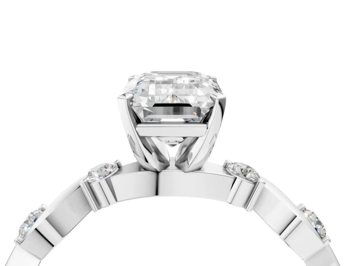 Emerald Cut Diamond Solitaire Twisted Band with Round Accents and Prong Setting Silver