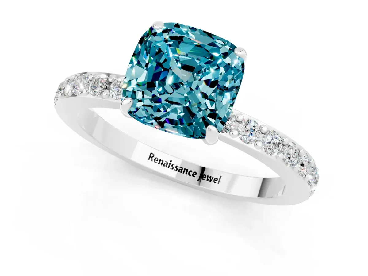 Cushion Cut Blue Topaz Solitaire Engagement Ring with Pavé Band and Four-Prong Setting White gold