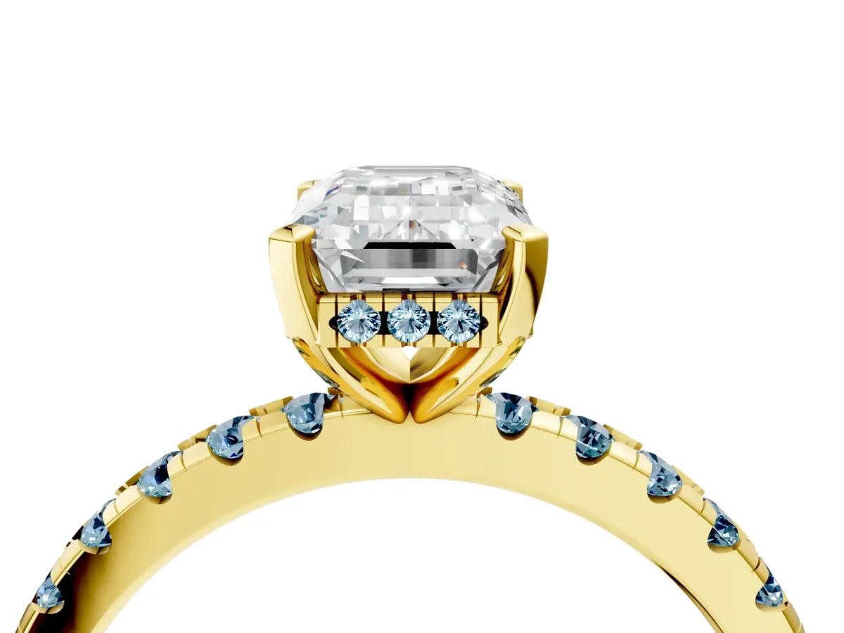 Emerald Cut Diamond Solitaire Ring with Round Aquamarine Pavé Band and Four-Prong Setting Yellow gold